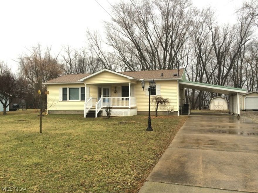Nicely maintained ranch home on  1/2 acre level lot in a great quiet location. 2 nice size bedrooms, 2 full baths and 1st floor laundry. There is a 2 car attached carport and a 1 car detached garage. The full basement could easily be finished. The kitchen is open to the dining room and includes all of the appliances. Neat and clean and in move in condition. 2 storage shed and the washer and dryer are also included. This is a prefab home so it will qualify for Rural Housing Financing.