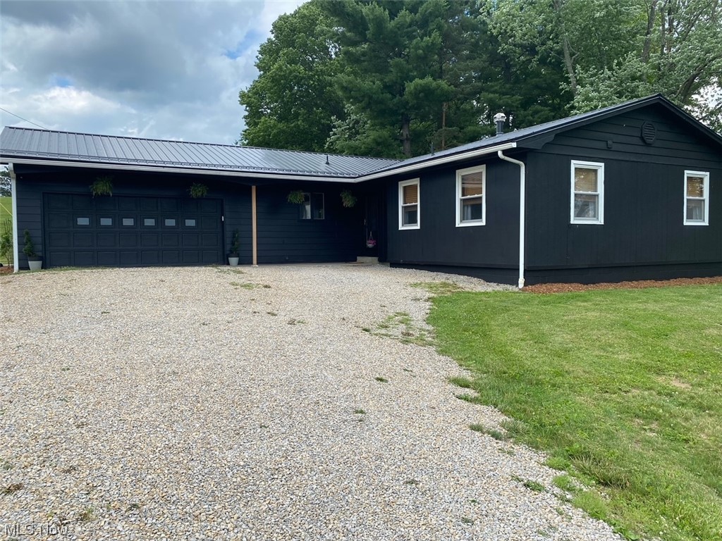You are going to love this recently updated, turnkey ready home that is priced to sell. The home sits on 0.37 acres and is within walking distance to East Muskingum Schools. Many recent updates (including a new metal roof in 2023) includes a tastefully updated 3 bedroom, 2 full baths main level complete with modern appliances and lighting, as well as a fully finished basement sporting a comfy family room, play area, and a good-sized laundry room (washer and dryer transfers to new owners). There is also a locked area in the basement for guns or other valuables that will be unlocked during showings to allow you to see this included security feature. Relax on the back patio and enjoy a peaceful view of an ample sized backyard, perfect for family gatherings and/or a play area for your kiddos or fur babies to romp in. Schedule a showing today to see this lovely home that only needs your own special touch to call it "home"!
