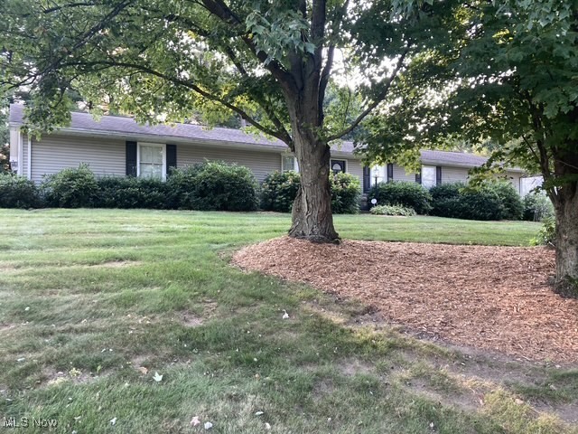 This home is the perfect blend of class and comfort. Located on the corner of Steubenville Rd. and Autumn Rd., the nicely landscaped two acre lot with frontage on both roads gives you some room to spread out and add more outbuildings if desired. From the concrete driveway, a walkway takes you through the front yard to the entry. Inside, a large living room with a nice brick fireplace provides a lot of room to entertain. French doors open from the living room to a beautiful screened porch with vaulted ceilings, which then opens onto a fenced-in patio featuring an in-ground pool. A pool house finishes the outdoor living space. The rest of the acreage contains a nice mix of trees and open land, making the property feel private even though it is right on a main road. There is an outdoor shed for extra storage as well. Back inside, the beautiful kitchen finished with cherry cabinets is located off of the living room and is the central heart of the house. The appliances, which are all high end, will stay for the next owner. Many other details really make this a luxurious kitchen. The dining room is conveniently located right off of the kitchen. Also branching off from the kitchen is a laundry/mud room with a new farmhouse sink and lots of storage as well as the entrance to the attached two car garage and the stairway to the partially finished basement. A hallway leaving the kitchen in the opposite direction takes you to a nicely updated full bath, two large bedrooms, and the main bedroom at the end of the hall. This room has plenty of space, a beautifully finished ensuite bath with a double vanity, and another set of French doors opening onto the patio. The current owners previously used this area for a hot tub right off of the bedroom.
This house has been thoughtfully designed, beautifully updated, and meticulously maintained. It is spacious and allows one floor living. Call today to see all that it has to offer!