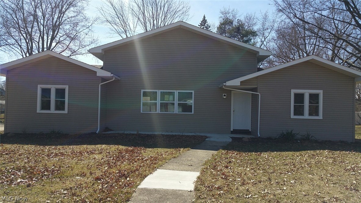 WOW! So much is new in the remodeled ranch with 3 bedrooms, 2 full bathrooms and 2 car attached garage! Enjoy a huge great room! Fantastic kitchen with solid surface counter, new oven, cooktop and dishwasher! Brand new bathrooms complete with tile surrounds! All new flooring! Fresh paint! Tons of storage! NEW roof, siding and windows! Private deck and back yard! Close to shopping, dining, schools and parks!