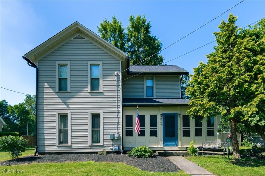 Welcome to this beautifully updated home full of character in the highly desired Northwest School district. . Located just a short distance from the scenic Towpath Trails, it’s perfect for those who enjoy outdoor recreation right in the neighborhood. A brand new roof adds peace of mind, and the inviting wraparound front porch offers a relaxing entry into the home. Inside, you’ll find stunning original woodwork, hardwood floors, and detailed wood doors that highlight the home’s unique charm. The living room flows into an additional flexible space—ideal for a home office, guest room, or cozy den. The kitchen features a mix of newer appliances, updated flooring and lighting, and vintage-style cabinetry that adds a touch of character. The modern full bathroom is located on the main floor has been completely renovated, and the mudroom at the rear of the home adds functionality for everyday living. Upstairs, enjoy fresh paint, new carpet, and ceiling fans throughout. The walk-out basement offers convenient outdoor access and plenty of storage options. Outside, the fully fenced backyard is your own private oasis, complete with a spacious deck perfect for entertaining, grilling, or just enjoying quiet evenings under the stars. This home is filled with love, charm, and history—ready to welcome its next chapter. Don’t miss your chance to make it yours. Schedule your showing today!