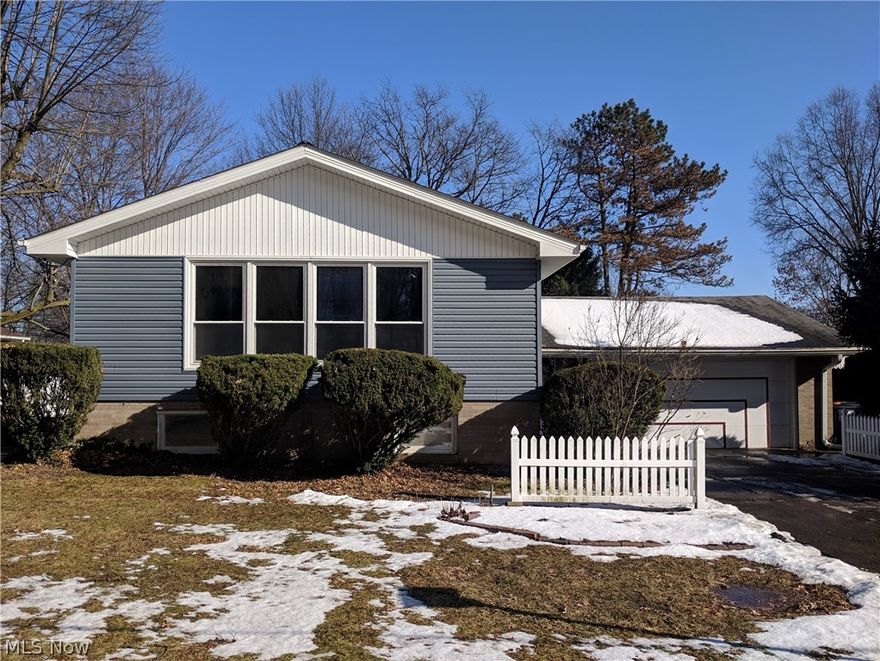 Need more room? Look no further. This North Canton home offers 1905 SQ FT 4 BR 2 BA and has an attached oversized 2 car garage. This  prime location is walking distance to The Chapel and minutes from I77 , The Strip, Belden Village and the YMCA. The main level has  big living room, formal dining, kitchen, 3 bedrooms and an enormous full bath with skylight. The lower level has a huge family room w/stone fireplace, 16 x 13 bedroom/office and a full bath. Plenty of room in the garage for all your toys! Some updates include vinyl windows, vinyl siding, dishwasher, disposal, new carpet in master bedroom and a thermostat.