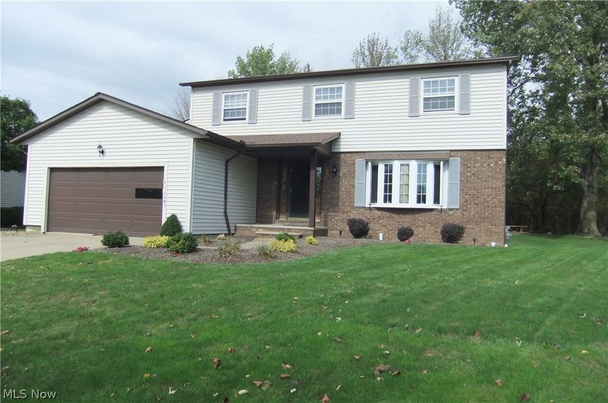 This home has what you've been looking for!  Kitchen opens to a family room with 3 seasons sun room with deck and patio area with fire pit!  Home sits on end of a cul-de-sac and backs up to private park like wooded area! Lot backs up to Gardenview Horticultural ParK !!  Updates includes roof tear-off (2014), basement waterproofed (2013) and windows (00).  Home includes a home warranty, nice size 1st floor laundry room, bay window in LR and family room has a fireplace!  Great space with 4 nice sized bedrooms and also a finished TV room in basement!  Buy now and enjoy the holiday's in your new home!