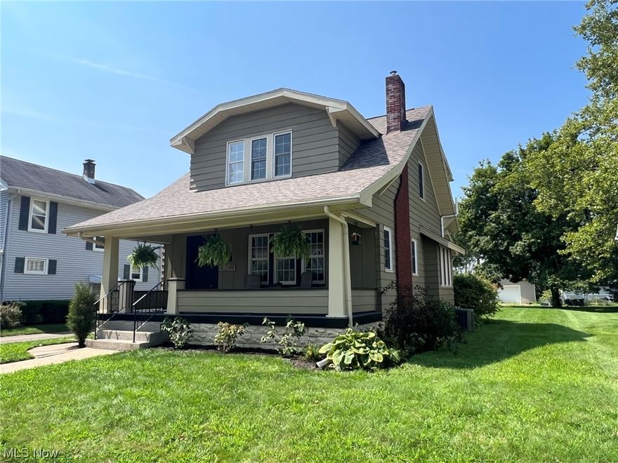 Beautifully updated 3-4 bedroom, 3 bath vinyl sided home in an excellent location, close to Tuscora Park.  New floor coverings and light fixtures throughout.  Brick decorative fireplace with barn beam mantle in the living room with built in cabinets.  Updated kitchen with new counters and island with butcher block counters.  Window seat in the formal dining room.  Barn door to the first floor laundry room.  A full bath on each floor includes the remodeled 2nd floor bath with whirlpool tub and new ceramic tiled shower.  Finished lower level with rec room, bedroom and bath.  Freshly graveled driveway leads to the detached garage.  A must see home!