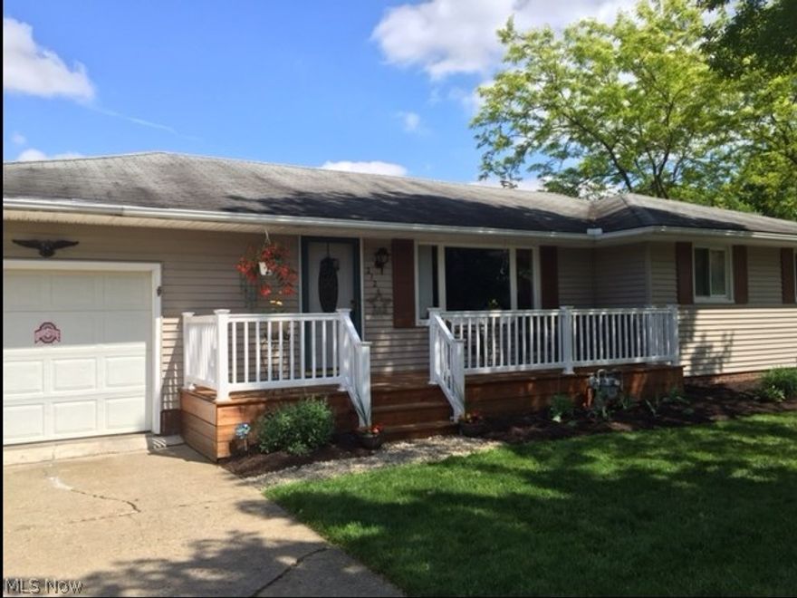 Freshly stained deck, new covering on the deck shelter, freshly mulched yard, flowers are planted, all you have to do is enjoy.  Weather takes you inside?  Entertain friends to watch the big game in your finished basement with a bar, and room for a pool table.  3BRs, full bath on main floor land all you need to do is hookup the shower to have an additional shower in the lower level.  This mid century ranch has some wood floors and will have some new windows by the time you buy it!