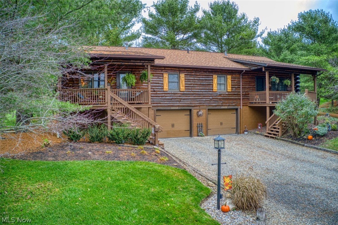 Beautiful log cabin condo in Dover! Very well maintained and updated with class, this condo is calling out for a new owner. Almost too many updates to list! Stunning open floorplan featuring an updated kitchen with granite countertops, stainless steel appliances and all new light fixtures. The kitchen effortlessly flows into the living area which boasts a remote controlled stone gas fireplace. Enough room to cozy up or if you need to spread out there is additional living space in the basement set up as a third bedroom. The garage is heated with a project area. The back deck was extended for more enjoyment and there is a hammock for ultimate relaxation. Schedule Today!
