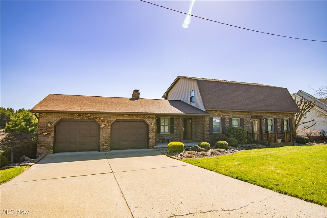 This is a custom built 2 story home that has all the features one desires. This exquisite design was built with taste and luxury in mind. It features a cozy rec room, cathedral ceilings, fully functional kitchen, formal dining room, spacious living room, sunroom with panoramic views. family room with fireplace and wet bar, and a two car garage plus much more!! You won't want to miss this one.