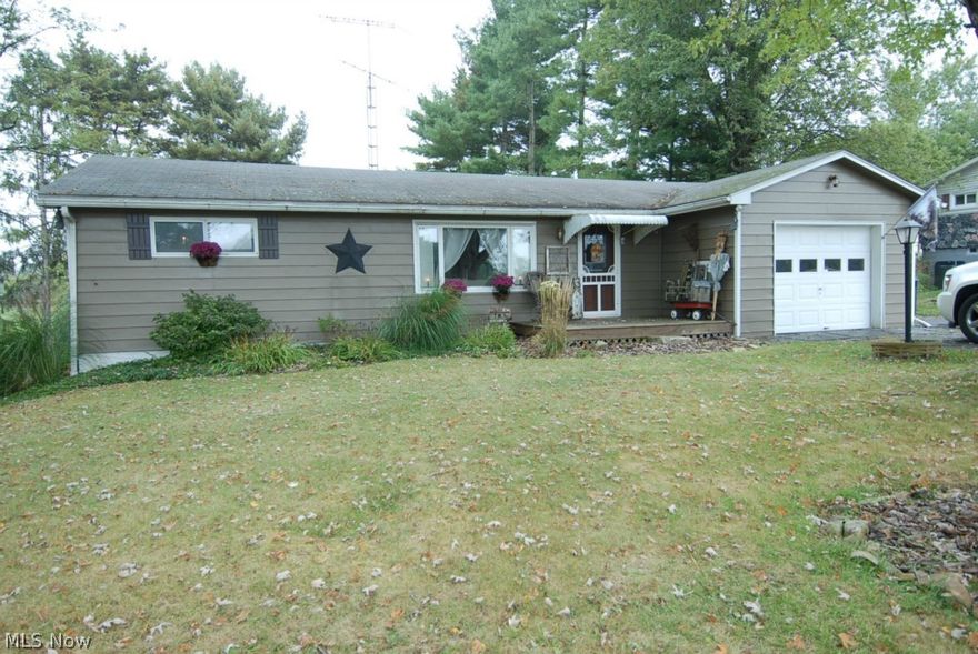 VERY MOTIVATED SELLER!!! Great location in the country but still less than 15 minutes from town and within 5 minutes from Interstate 70.  This ranch style home offers 3 bedrooms and one full bath. Master bedroom with his & her closets. Beautiful original hardwood floors add character to the home.  Many updates have been made throughout. Recently installed new toilet.  In the back yard, the deck is perfect for entertaining and the .91 acres allows for privacy and plenty of room for a family.  The basement has been waterproofed and has a lifetime warranty to transfer upon sale of property.  Large shed remains with the property for storage for all lawn equipment.