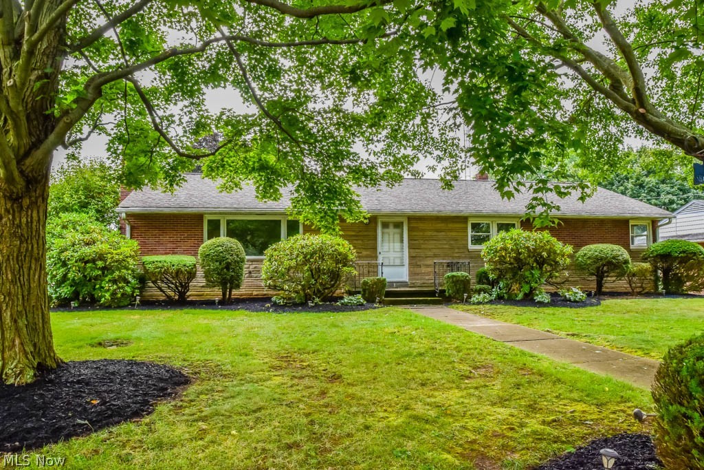 Move-in ready 3 bedroom, 2.5 bath brick ranch on a corner lot in Plain! Neutral colors with new flooring and fresh paint throughout! Prepare your favorite dishes in the applianced eat-in kitchen with a pantry, refrigerator, countertop range and a wall oven. Enjoy meals in the casual dinette or in the formal dining room with a picture window. Gather in the spacious living room with a picture window, built-ins and a fireplace. Down the hall, there are 3 generously sized bedrooms and a full bath with dual sinks. Deep hallway closets plus a linen built-in, as well. Convenient half bath before you head out to the enclosed back porch with access to the 2-car attached garage. Extra living space on the finished lower level with a large rec room, a full bath, tons of storage and a huge family room boasting a fireplace and walk-up access to the garage. Come see all this home has to offer!
