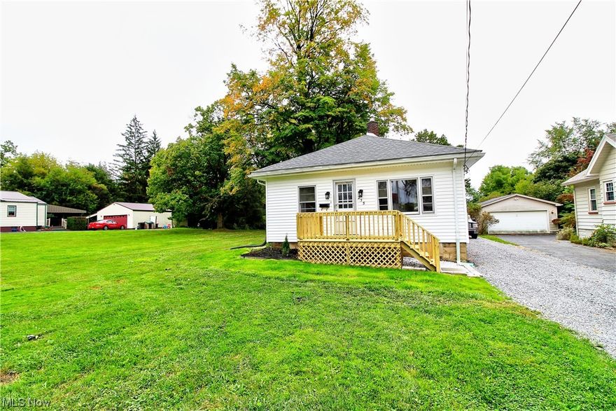 Remodeled two bedroom, one full bath Ranch home in Boardman, Ohio.  The house has been renovated from top to bottom.  The exterior updates include a new roof (4-5 years ago), brand new treated lumber front deck, new garage door and fresh landscaping.  The interior features a waterproofed basement (2020), brand new furnace and central air conditioning, 100 amp electrical service.  Upstairs has all new carpet, all new paint, newer tub and bathroom vanity, brand new flooring in dining room and updated light fixtures throughout.  Large spacious yard with 60 feet of frontage and 300 feet of depth.  This house is move in ready.