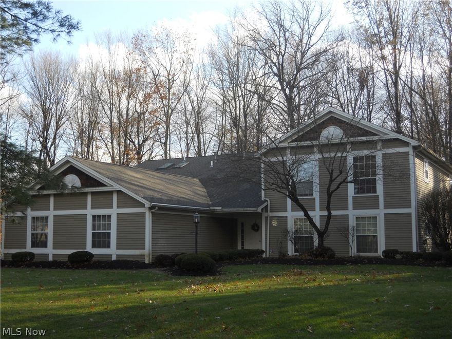 JUST PUT ON THE MARKET! Ideal 2 bedroom MAIN FLOOR UNIT with open concept between living room, dining room and foyer. Delightful kitchen with all appliances, ceramic floor and eating space. Enclosed rear porch looking into wooded setting. 2 full bathrooms that includes a walk in shower in master bedroom and laundry room with laundry tray sink and washer/dryer. Up dated roof shingles and driveway/parking area. Attached garage plus additional storage room on second floor! Don't wait call today! Immediate occupancy upon transfer.