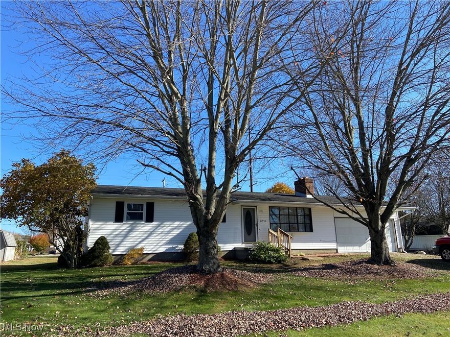 First time offered!  Ranch sitting on 4 parcels.  Lot 165 x 145, alley bound in the rear.  This property has bright living room with neutral carpet and wood burning fireplace.  The eat-in kitchen feature a cozy nook, breakfast bar for one,
stainless range & refrigerator.  Each of the 3 spacious bedrooms has a double closet & new ceiling fans with nightlights.
Spacious full bath is equipped with a nice vanity, one piece tub/shower with additional hand grips for safety & support.
A lower level family room adds immense possibilities for additional bedrooms, office space, play area.  A wood burning
fireplace enhances this lower level area for a cozy feel.  Fireplace has built in blower system.  There is gas to the property-gas logs are not out of the question.  Pool table may stay.  A deep covered back porch off the kitchen is a great place to spend time relaxing.  There are 2 sheds that stay with the property.  There is an open lot to the right of the house that has a larger shed on it.  Many possibilities for the extra lot.  This is a neat & clean property.  All carpets have been cleaned and ready for new owner.  
Coshocton County.  Not in Newcomerstown city limits.  Newcomerstown water & sewer.  Very little traffic.  Don't miss this one.