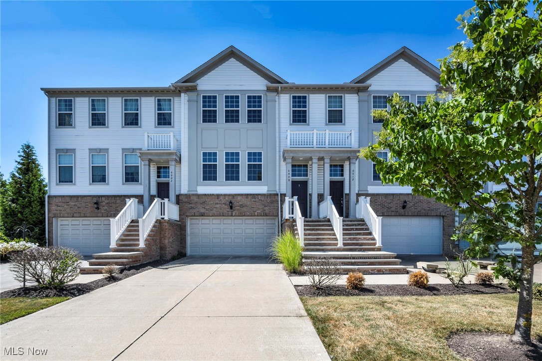 LOCATION, LOW-MAINTENANCE AND LUXURY describes this spacious 3-bedroom, 3.5-bath Pepper Pike townhome, quietly nestled within the lovely community of The Pointe at Sterling Lakes. Blending privacy, convenience, and comfort, this beautifully maintained home is just a short stroll from the Shops at Eton Collection, an array of dining options, and offers immediate freeway access. Inside, enjoy a light-filled living space with large windows, a cozy fireplace, and an open layout perfect for everyday living and entertaining. Each bedroom features its own private bath and spacious closets, offering flexible and comfortable accommodations. Step outside to relax on the main-level deck or the private lower-level patio. The attached 2-car garage includes additional storage space and a sleek epoxy floor, adding both function and style. With its private setting and unbeatable location, this low maintenance home truly has it all!