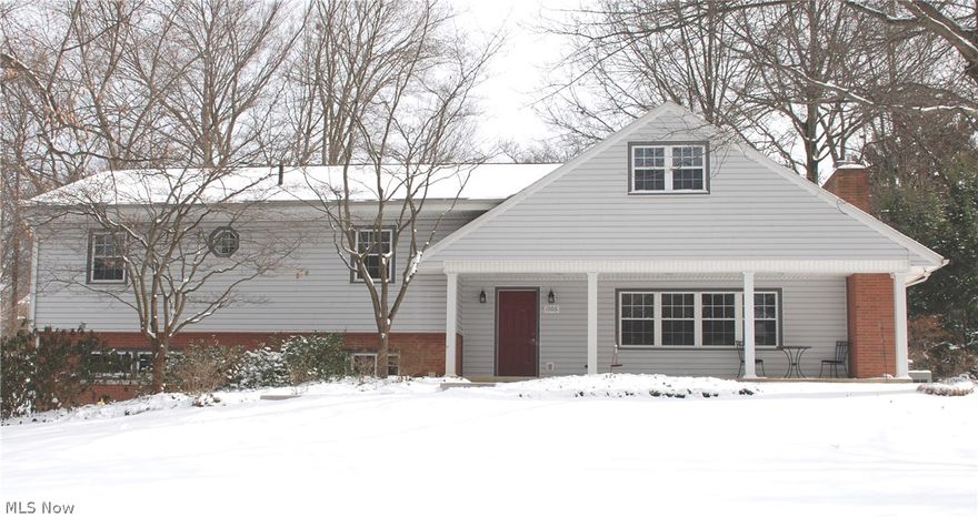 Unique and spacious 5-bedroom, 3.5-bathroom home situated on a ½+-acre treed lot. Enter into the first floor foyer with ceramic tiled flooring and vaulted ceilings.  On this main level you will find a large great room with dining area and a wood-burning fireplace and a carpeted living room with an additional gas fireplace.  This open-concept floor plan also includes an absolutely beautiful chef’s kitchen with granite counter tops, cherry wood cabinets, ceramic tiled floor and all stainless steel Kitchen Aid appliances!  This level walks out onto a large brick patio with brick walkways, surrounded by beautiful landscaping, which spills out into an inviting outdoor setting. From the foyer, enter two separate bedroom areas.  To the right: main master bedroom, bathroom and a bonus room/nursery. To the left: the original master bedroom/bathroom, additional full bathroom and 3 large carpeted bedrooms, one with built-in shelves.  The lower levels include a large recreation room, additional li