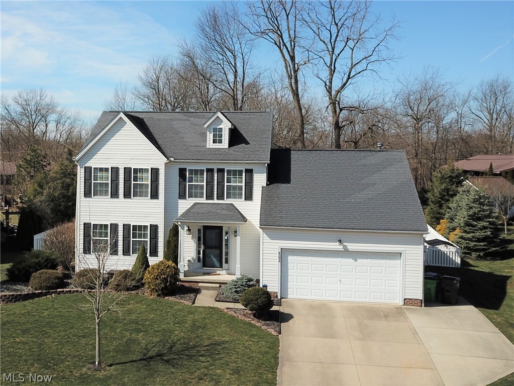 Welcome to 4394 Ridge View Drive in Uniontown! You will be amazed at this beautiful 3-bedroom, 2.5-bathroom home as soon as you pull up; it has bright white siding complimented by black shutters. The spacious backyard is fully fenced in and has a large porch, perfect for relaxing or entertaining outside. Step into the spacious foyer to see entrances into the formal living room and kitchen. The eat-in kitchen has lovely luxury vinyl plank flooring, a breakfast bar, and access to the backyard through the sliding glass doors. A cozy den with a fireplace and slanted ceiling is located right off the kitchen. Half bath and laundry room both located on main floor. Upstairs you will find the master suite (complete with a walk-in closet and bathroom), along with two more bedrooms and another full bath. The stunning finished basement offers so many possibilities! Brand new furnace, new furnace and roof. This home is located in a quiet neighborhood, yet is still conveniently located a few minute