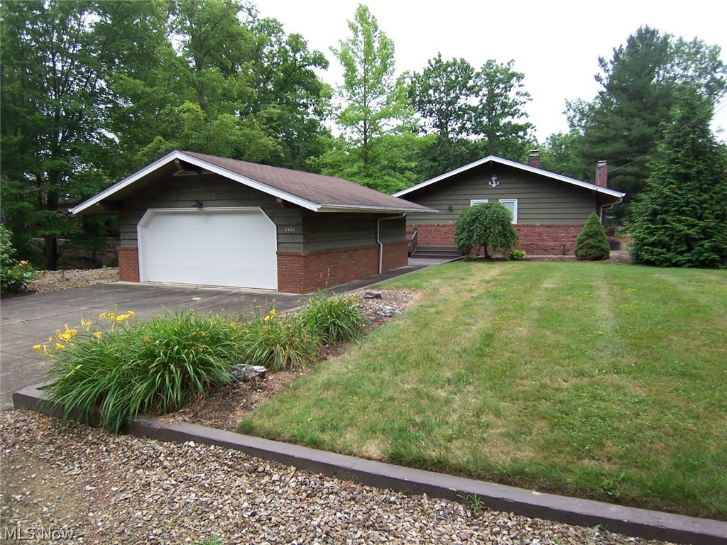 Superb lakefront location on a big cove just seconds to the main lake. Perfectly maintained home but needs your help to update to your liking. Larger lot than most with a side inlet for docking. Walkout basement leads to inlet and dock area. Low maintenance yard. Bedrooms are good sized. Master has its own bath. Great room has vaulted wood and beamed ceiling, stone walled fireplace and includes dining area. Two 8' sliding doors from great room lead to a wonderfully large, pavered outdoor area with all the great views and access to the lake! Perfect vacation home to getaway from the hustle and bustle of the city!