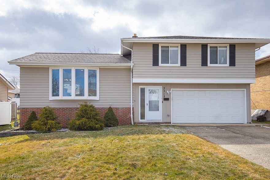 Welcome to 3315 Nottingham Drive! This spacious and well maintained 3 bedroom 1.5 bathroom is waiting for you! Upon entering the home you find beautiful ceramic tile flooring and solid wood steps throughout. Entering the family room you'll notice a lovely bay window (installed '21) that lets in just the right amount of nature light. Family room also offers natural hardwood floors which flows into the dining area and recessed lights that make it the perfect space for family time or entertaining. Kitchen offers stainless steel appliances, updated cabinets, ceramic tile, tons of counter space, double bowl sink and great view into the backyard. As you make your way to the top floor you can't miss the classy and sophisticated, wrought iron balusters that add timeless elegance to the stairway. Three nice sized bedrooms with an updated bathroom complete with ceramic tile as tile flooring, walls, and shower/tub surround! Lower level room offers a great space for further relaxation, playroom, office space, or additional family room! Be sure to notice the fully fenced in yard, detached storage shed (electricity and shelving system), tons of yard space for kids/pets and three season room (electricity) that gives you a space to enjoy the outdoors from Spring to Fall! Schedule your appointment today! One year home warranty included!