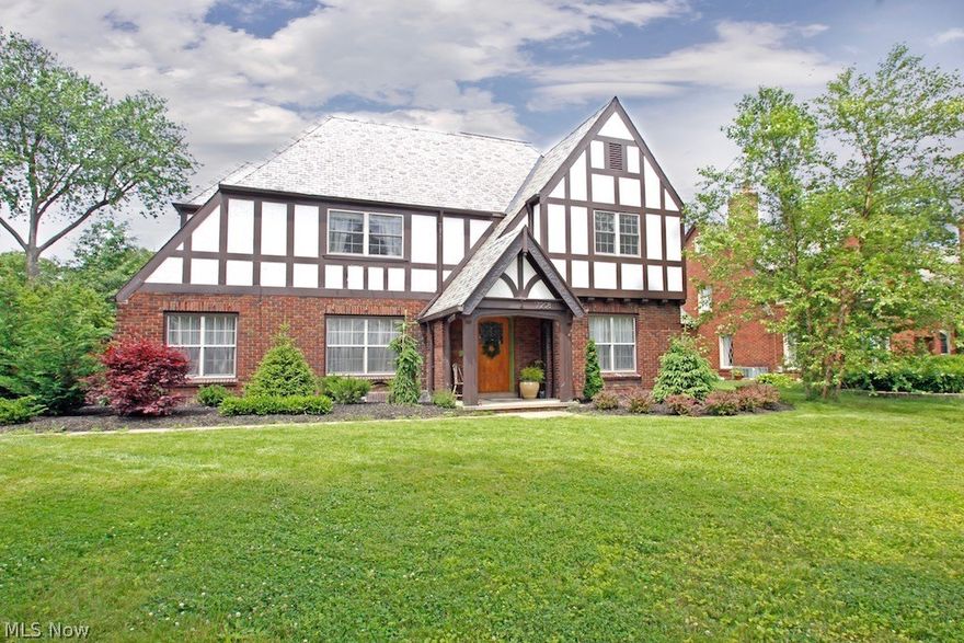 Located on Lake Avenue, this 1922 Tudor gem in a neighborhood of grand homes, boasts 4 bedrooms, 3 full and 2 half baths and an attached two-car garage.  Enormous living room, master bedroom and lower-level family room spaces.  Hardwood flooring, gracious trim and hardware throughout. Current owners have lovingly restored and updated the home respectful to its era.  A true chef’s kitchen was created through updates in 2010 which include cabinetry, marble countertops, tin backsplash, imported AGA stove and abundant storage areas. Additional work includes extensive bathroom plumbing updates (2012-16), new high-efficiency boiler (2010), exterior waterproofing (2017), grading & landscaping (2018), flat roof replacement (2015). The home’s magnificent slate roof and Tudor style stucco and beams have been professionally  maintained. Windows are newer. Private backyard patio. Move in and enjoy!