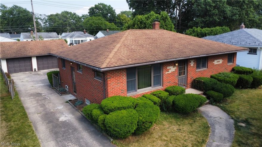 Move In Ready!! This home has been meticulously maintained and lovingly cared for * The living room, dining room & all bedrooms feature glowing hardwood floors * Hardwood cabinets in the kitchen & room for a bistro style table to enjoy your morning coffee * The 4-season sunroom located off the dining room, offers newer LVT flooring & replacement windows that are less than 1 yr. * Additional living space is located in the lower level where you will find a 2nd kitchen, recently remodeled full bath, laundry area & very spacious rec room * Major updates to this home include, newer Anderson windows throughout, all interior/exterior doors, roof and garage door & opener which was installed in2024 * All appliances, including the chest freezer in the basement will remain * If you love to grow your own vegetable than you will enjoy the garden space in the sunny back yard * Located within walking distance to James Day Park & Cuyahoga Community College *