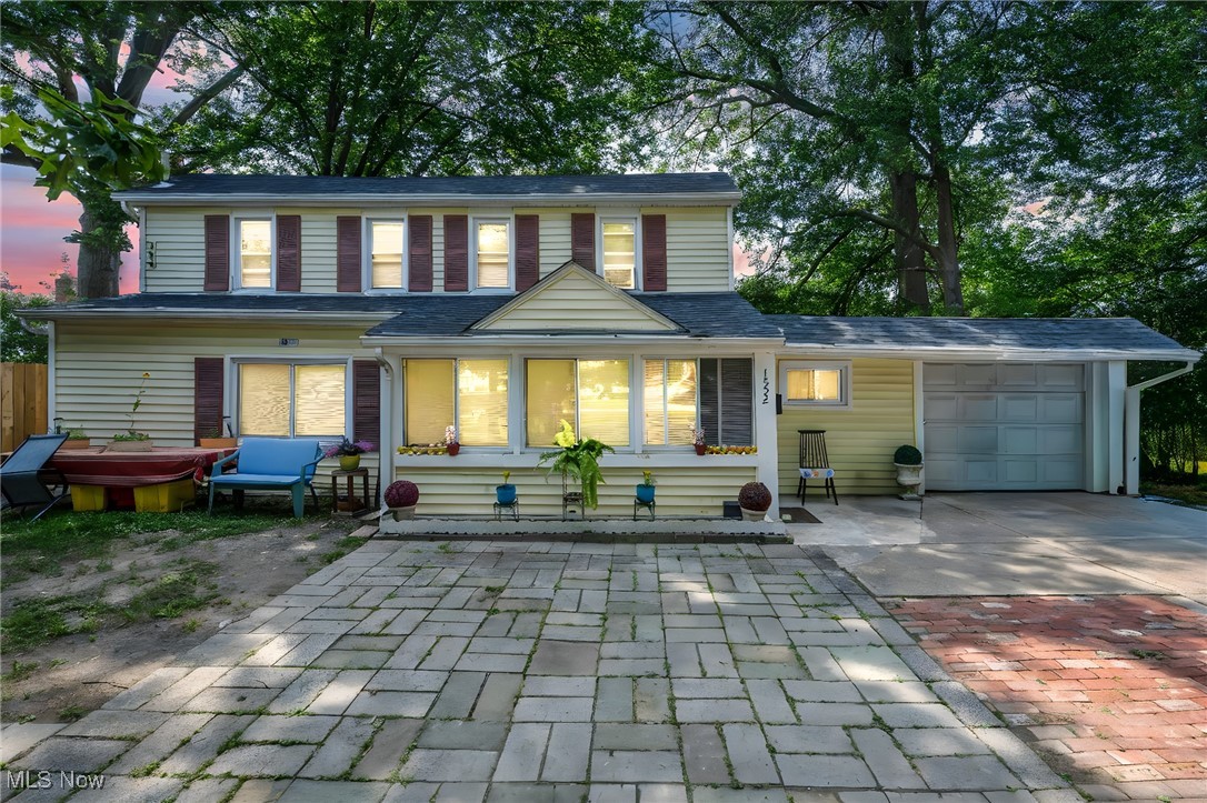Welcome to this beautifully renovated colonial—an ideal opportunity for first-time buyers or savvy investors! This move-in ready home has been thoughtfully updated from top to bottom, offering peace of mind with a brand-new roof, windows, electrical, plumbing, and flooring throughout. Step inside to a spacious living room filled with natural light and a convenient half bath. The renovated kitchen features warm oak cabinetry, new countertops, modern fixtures, and a large bay window that brightens the space. Appliances include a stove, microwave, and dishwasher. The main floor also offers a first-floor bedroom and laundry for added convenience. Upstairs, you’ll find two more generously sized bedrooms and a fully updated bathroom with a sleek gray vanity, modern tile shower surround, and new finishes. Enjoy outdoor living with a sizable backyard perfect for entertaining, gardening, or relaxing, plus a charming paver patio in the front and an attached 1-car garage. Nestled on a quiet residential street, this home combines comfort, style, and convenience—all at an incredible value.