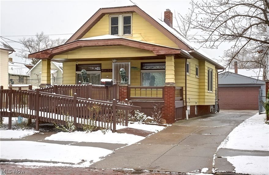 This home is located on one of the city's historic red brick roads. As you arrive, you are welcomed by a large front porch which flows right into the living room, accompanied by hardwood floors. The living room flows into the dining room, which has all the old charm and character you are looking for, with the original built-ins and window seat. Also located on the main floor is the kitchen, two bedrooms, and the bathroom. Once you journey up to the second floor, you will be greeted by the newly renovated and carpeted, spacious third bedroom. You'll be wonderfully surprised when you make your way to the basement to see all the unexpected space: large utility room, workshop, and recreation room. Put your mind at ease with newer roof/gutters, windows (2019), furnace/humidifier/ductwork/central a/c (2020). That's not all this property has to offer - the driveway has been paved and an oversized two car detached garage rounds out the list of improvements.