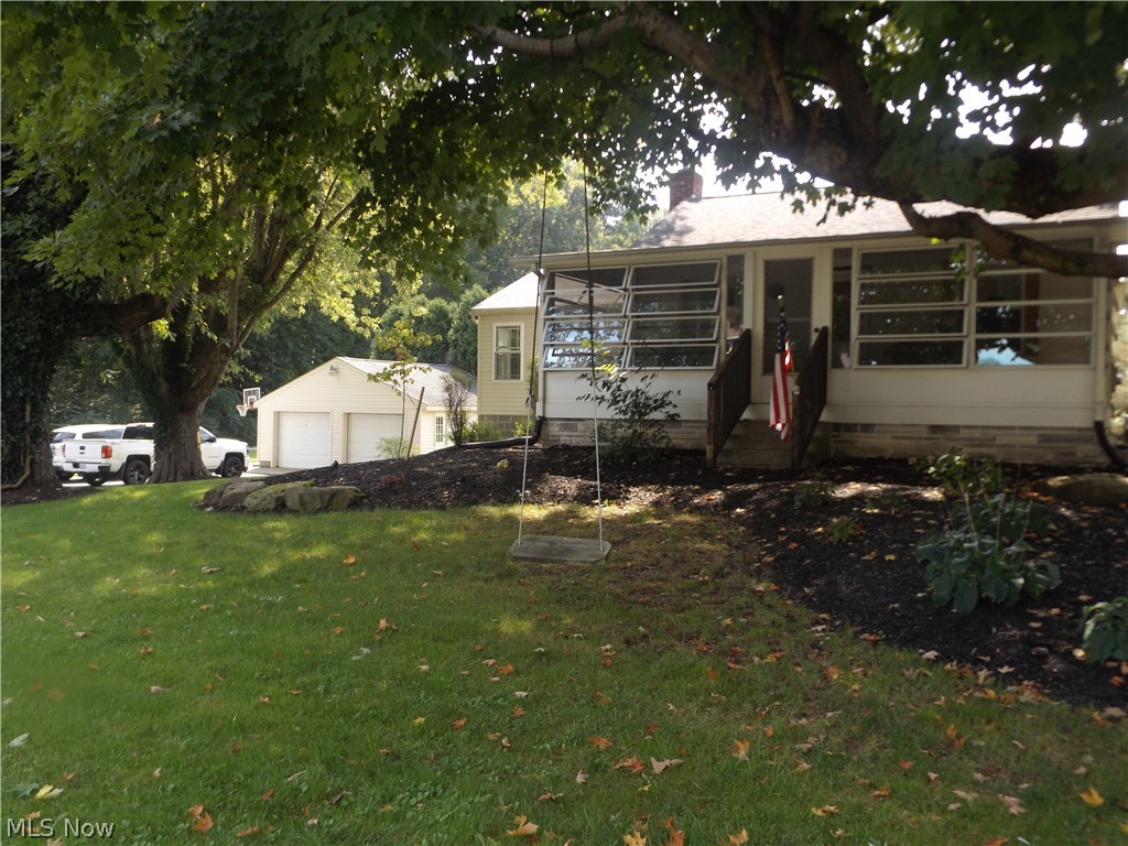 What a find in Green schools. This remodeled ranch does not disappoint. Close to an acre. Walk out lower level. Spacious front porch. 3 full bathrooms with a master suite off of the kitchen with cathedral ceilings and modern touches.