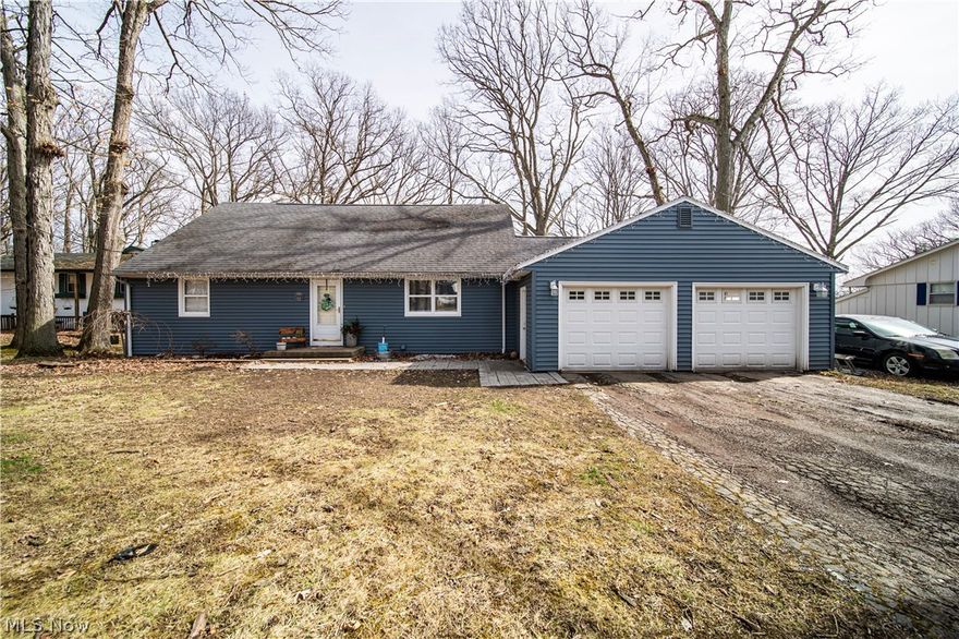 Want to over look a serene wooded setting along the Ashtabula River? Here's a  4 bedroom, 2 full bath home situated atop a lovely, wooded setting. Wake up to  the beauty and charm of each amazing Northeast Ohio season on this gorgeous hillside lot! Step in to see this home has all the space you will ever need and  then some. Two large bedrooms on the main floor, and 2 more large bedrooms are located on the second level. Two huge living areas off of the kitchen, can either be living and family rooms, or make the back area a formal dining room.  The laundry is located in the lower walk-out basement. Nestled in the back of a well manicured neighborhood. This  setting is a nature lover dream!