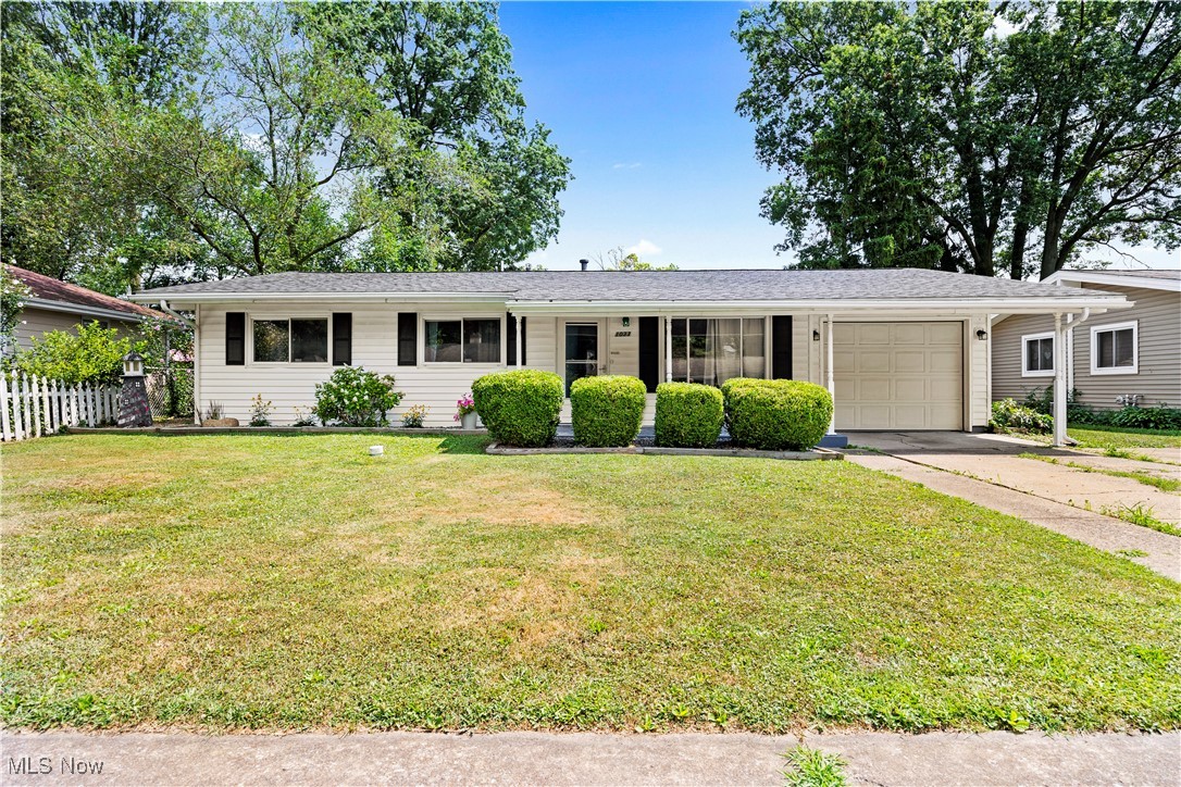 This home is like new! Beautifully remodeled ranch house, featuring white vinyl siding, offers an array of modern upgrades and charming features. Located close to downtown Vermilion, Main Street beach and shopping, this home is perfectly situated for convenience and relaxation. The exterior boasts a newer roof, double-hung windows, vinyl siding, and a covered front porch, ensuring energy efficiency and curb appeal. A one-car garage with a painted floor, newer garage door, plus additional parking for up to two cars on the paved driveway, provides ample space for vehicles. Enjoy year-round comfort in the spacious four-season sunroom addition, perfect for entertaining or relaxing. The fenced yard includes a patio for grilling, a raised garden bed, and beautifully landscaped surroundings, along with a newer shed with electric and ample storage space. Inside, modern comfort is guaranteed with a newer high-efficiency furnace and central air system, and updated electrical. Single-floor living is complemented by a large mudroom off the garage, with plenty of storage. And there's a first-floor laundry room off the kitchen. The kitchen is completely remodeled with white cabinets, new countertops, top of the line stainless appliances, and new flooring. The fully remodeled bathroom features new tile floor, vanity, and a stylish tile shower. Situated on a quiet cul-de-sac street with curbs and sidewalks, this home offers a peaceful, family-friendly environment. This home has it all! Completely remodeled. There's nothing to do but move in. Don’t miss out on this incredible opportunity to own a meticulously updated home in a serene neighborhood. Schedule your viewing today and experience the perfect blend of comfort, style, and convenience!