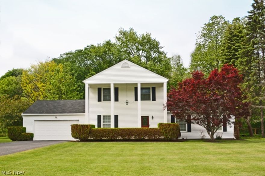 Beautifully updated Colonial on 1 and 1/2 acre lot.  Too many upgrades to list.  Every square foot of this home is updated including the furnace, roof and central air!  Huge eat-in kitchen with island, newer kitchen cabinets, and all appliances included.  Extra large family room with wood burner, and  door leading to back-yard and patio.  Large living room with fireplace, French doors lead to family room.  Great open floor plan, tasteful, neutral décor.  First floor office with built in bookcases and 2 closets could be used as a 4th bedroom.  First floor laundry room with plenty of cabinets.  Beautiful master suite with balcony over looking wooded back-yard, glamour bath, and walk-in closet.  All bedrooms have ceiling fans and ample closet space.  Very private back yard, backing to the woods with wooden play-set and storage shed.  Wooded, yet plenty of grass play area.  Move in condition.  Immediate possession available.