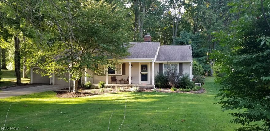 The beautiful ranch features stainless steel appliance in the remodeled kitchen with granite counter tops.  Wood flooring in the living. Remodeled bathrooms, with title flooring. Large finished basement with bar and fireplace. Large laundry room with steam room.