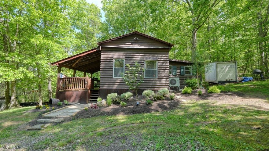 25 Acres and a GREAT setting !! This adorable cabin is nestled back in the woods. You could hunt from the covered front porch or the deck off the main bedroom. Many updates include- refinished wood floors, tongue and groove added to the kitchen, great room ceiling, bathroom and in the main bedroom. New toilet, sinks and flooring, new mini split AC/Heat in 2024. All new PIC water lines, new carpet in the loft bedroom and deck  in 2024. 2 deer blinds, landscaping, cabin freshly stained in 2023. Also added skirting and a storage area under the front porch. All Furniture (new in 23)  stays except for the entertainment center. Nothing like this on the market so don't hesitate !!