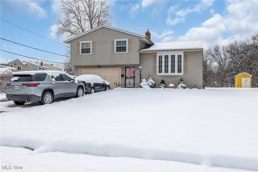 Welcome to this inviting split-level home in Bedford Heights, offering modern comfort and thoughtful improvements throughout. This spacious 3-bedroom home features a bright living room with large windows adjacent to a large dining area. The kitchen boasts plenty of storage and stainless steel appliances. Half bath on the main level An inviting lower-level family room is ideal for relaxing or entertaining. Three bedrooms and a full bath upstairs. The enclosed patio overlooks a generous backyard perfect for gatherings, hobbies, or quiet enjoyment. Storage shed at the rear of the property. Recent upgrades include a fully remodeled bathroom completed in 2023, a new furnace and central air system installed in 2021, and updated windows from 2016, providing efficiency and peace of mind. With an attached 2-car garage and a well-maintained interior and exterior, this property blends convenience with charm—an excellent opportunity for anyone seeking a comfortable home with valuable updates.