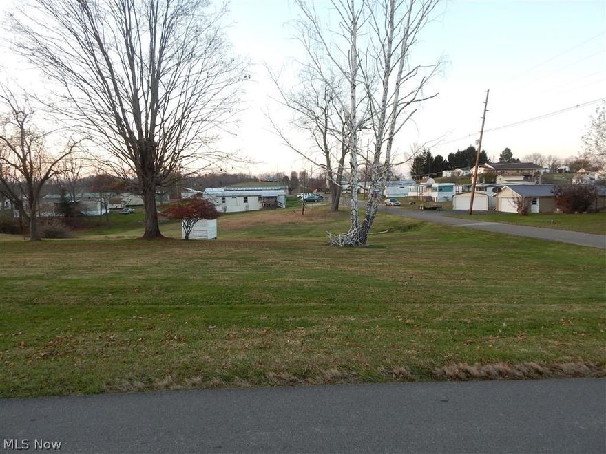 Approximately 130 x 150 corner building lot in Oakwood addition of Harrisville.  Public utilities available and lot has access from two separate black top city streets. 
Some deed restrictions, call for details.