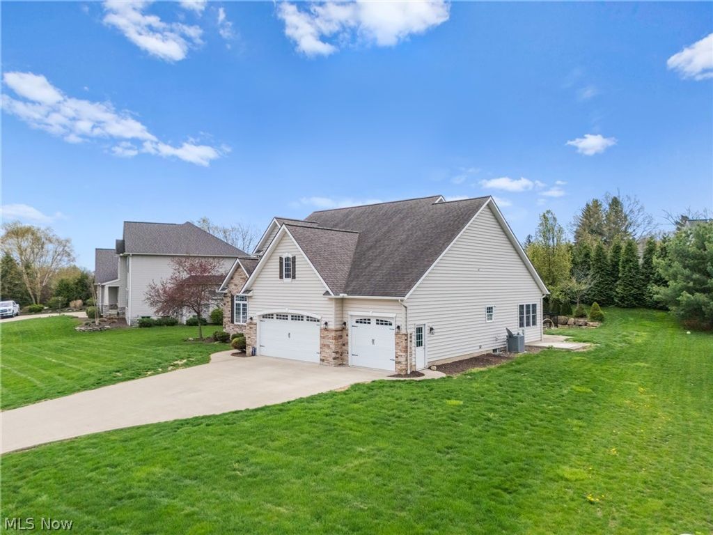 Photo of 8888 Scotsbury Street NW, Massillon, OH 44646 (MLS # 5204185)