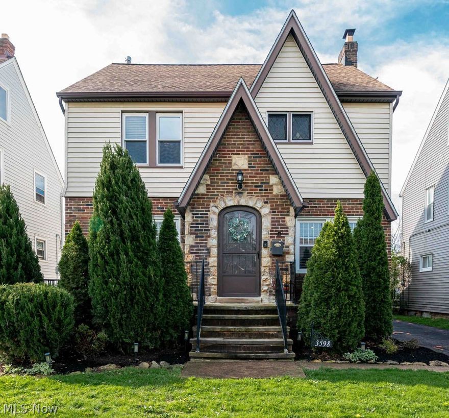 Welcome to this beautifully updated brick Colonial in the heart of University Heights, offering the perfect blend of classic charm and modern functionality. ***Check out the 360 Degree Panoramic Virtual Tour and Floorplans!*** This spacious 4-bedroom, 2.5-bath home features rich hardwood floors, a large living room with fireplace, and a formal dining room with built-ins ideal for entertaining. The updated eat-in kitchen offers ample cabinetry, modern appliances, and great flow into the main living spaces. A bright sunroom with vaulted ceilings provides the perfect flex space for a home office or relaxation. On the 2nd level, you’ll find a large primary bedroom with walk in closet, two additional generously sized bedrooms, another four season sun room with closet, along with an updated full bath. The third-floor suite offers an additional bedroom and another updated full bath complete with a separate shower and tub. The partially finished basement adds even more versatility with a recreation area, two storage rooms, and laundry. Outside, enjoy a private fenced yard, deck, patio, and a detached 2-car garage. Newer Windows, Roof, HVAC, Water Heater, Electrical, and Much More! Conveniently located near parks, shopping, dining, and just minutes from University Circle, this home offers both space and location in one complete package.  Easy Freeway access and a short distance to the Cleveland Clinic, UH, CWRU, JCU, and more! To be POS Compliant upon Title Transfer. Home Warranty Included.  Call for Your Private Showing Today!