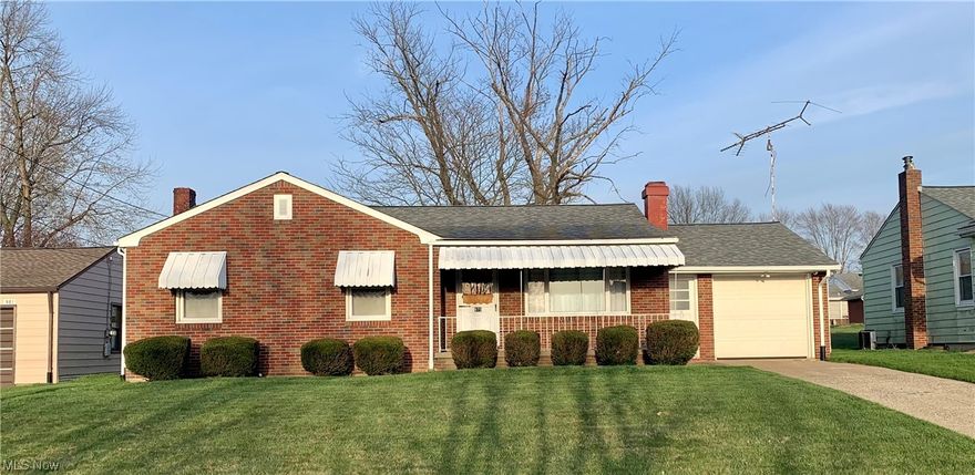 Well Maintained Ranch near Tod Park featuring 3 Bedrooms, 1 & 1/2 Baths.  Kitchen with Eating Area and Newer Appliances!  Living Room with Woodburning Fireplace.  Spacious Recreation Room with Bar in Basement.  Enjoy the Front Porch plus Large Covered Brick Patio.  Attached Garage.