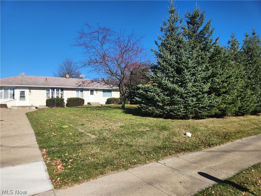 Very nice and large, 2-3 bedroom ranch home with a 2 car detached garage on a large 1.47-acre lot, located in Seven Hills.  Eat-in kitchen, Stone faced fireplace in the family room with tile/hardwood floors, and sliding doors to oversized deck. There is a dining room and office along with a very large living room, which had been used as a bedroom at one time. The 2 bedrooms, off of a hallway with remodeled tiled bathroom, also have sliding doors to the deck.
Below grade, there is a finished paneled basement: Laundry room, recreation room with bar, kitchen, and many storage and closet areas.
There is a large vegetable garden located in the backyard.  Please note: according to the realist records, this home has 3 bedrooms, and a 1040 square foot unfiinished basement.  There have been some alterations/remodeling done to the home, as the basement is finished and the 1040 basement square footage has been included in the total square footage, and there are 2 bedrooms with closets.  Estate Sale Selling As-Is-Condition