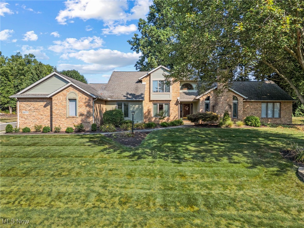 Welcome to this lovely spacious 4-bedroom home located in Bob O’Link Estates. Featuring beautiful hardwood floors and thoughtful design, this residence offers comfortable living with several updates throughout. The first floor includes everything you need, starting with the owner’s suite complete with a private bath featuring heated ceramic tile floors, a double vanity with granite countertops, and his and her closets. An additional bedroom (or office) with a closet and an adjacent full bath provides flexibility for guests or work-from-home needs. Step into the foyer and you’ll be greeted by an open-concept layout and lovely hardwood flooring. The step-down living room showcases removable bookcases and a cozy gas-starter fireplace. The dining room and living room flow seamlessly into the spacious step-down family room, also featuring a gas-starter fireplace and direct access to the inviting three-season room—perfect for entertaining or relaxing year-round. The well-appointed kitchen includes a removable butcher block workstation and an adorable dinette with walk-out access to the deck, ideal for enjoying morning coffee or evening gatherings. Upstairs, you’ll find two additional generously sized bedrooms that share a convenient Jack-and-Jill full bath. Home offers a Kohler full house generator.