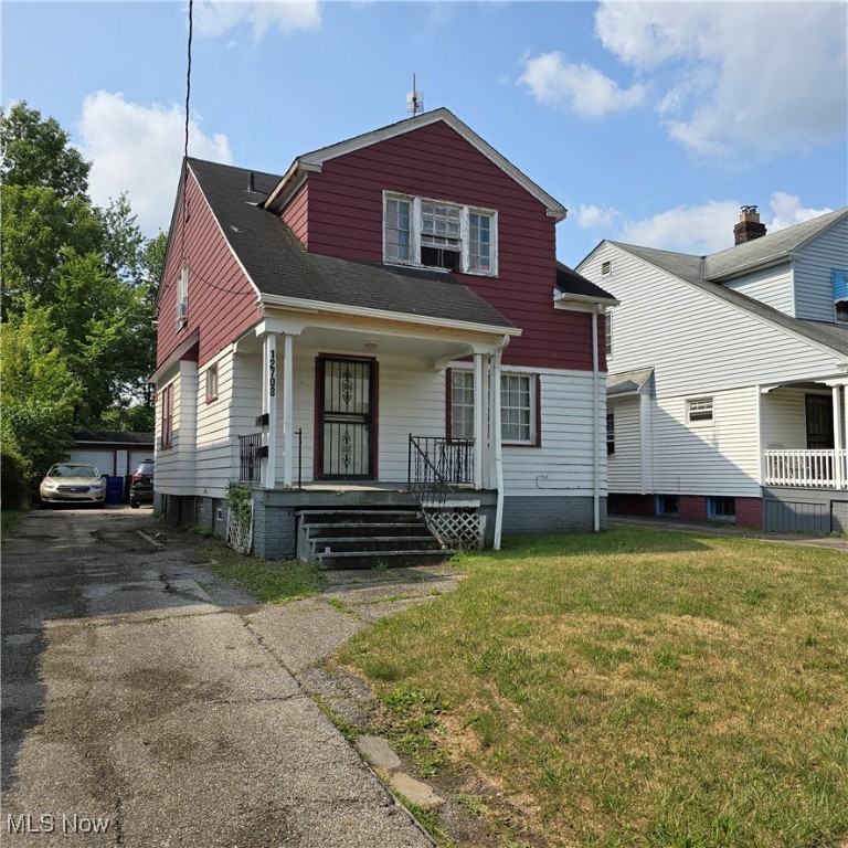 Two family with 2 bedrooms and 1 bath in each unit!! Needs work. The garage can be saved but needs work. 1st floor is vacant. The 2nd floor is occupied. To be sold as is. Cash only.