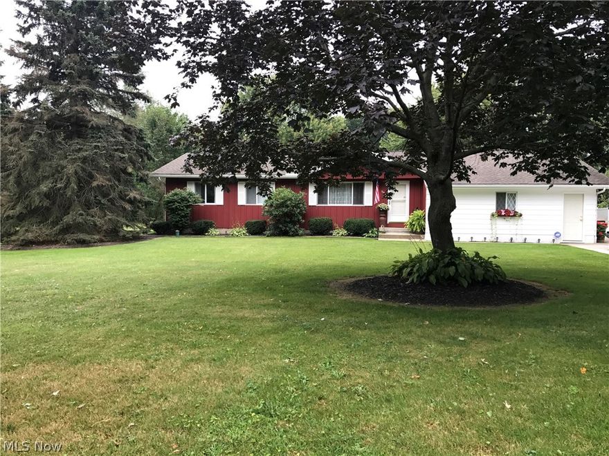 Welcome home to 3186 Lake Rockwell, a gorgeous 4 bedroom ranch on over 5 acres!