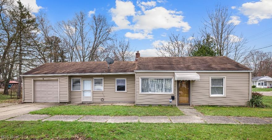 Welcome to 2407 Nesmith Lake.....Situated on a dead-end road with views of the water and the tow path, this adorable home has so much to offer!  A nice-sized livingroom welcomes you in with neutral carpet and sightlines into the kitchen. The kitchen boasts plenty of cabinetry and ample counter space and an eating area. Two nice sized bedrooms have neutral carpet and fresh paint and share the full bath. The flex room and spacious laundry room are just off the eating area and the attached garage. Updates include a newer roof, siding, windows, garage door, carpet, light fixtures and fresh paint. Conveniently located to the interstate, shopping and restaurants. Schedule a showing today!