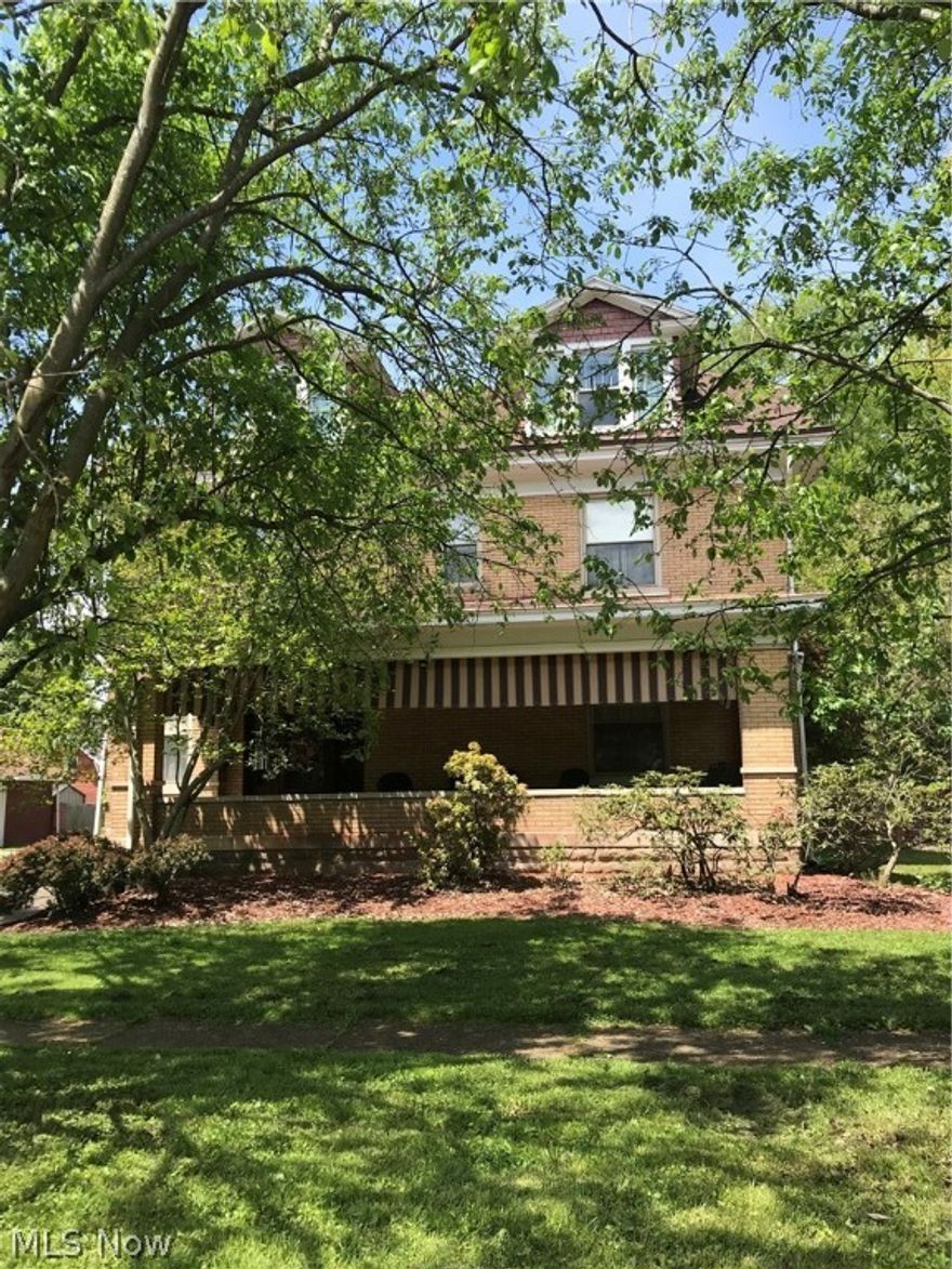 This gorgeous brick home located off of Washington Ave. offers 4 Bedroom, 2 1/2 bath. Inviting large covered front porch. Huge living room with gas log fireplace.  Beautiful hardwood floors, freshly painted interior.  Gorgeous pocket doors open up from living room to massive dinning room.  Master Bedroom suite is the entire 3rd floor: with large walk in closet, jacuzzi bathtub, window seats, private dressing room. Home features a beautiful privacy fenced back yard with a courtyard feel. A nice paved driveway leading up to a  2 car garage.  Home is complete with ADT security system throughout. So much character and charm, a must see to appreciate.