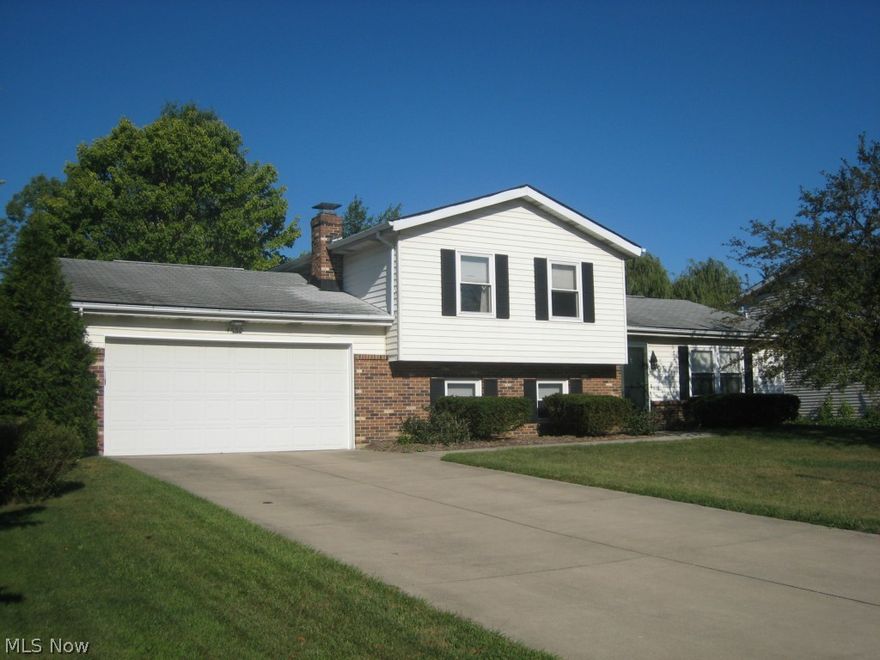 Sherwood Acres. Nicely updated 3 level split with spacious floor plan. Foyer entry walks  into the open living room/dining room "L" combo. An awesome sunroom with windows around, skylights and new carpet.   The back yard is all fenced, perfect for children and/or pets! The applianced kitchen has space for a table.  Upstairs you"ll find 3 good sized bedrooms with ample closets and full bath.  The family room has a beautiful full wall brick fireplace with hearth and is steps away from the half bath and laundry/storage area.  You will enter from the attached 2 car garage w/opener here.  Updates include Furnace-8 years, Champion windows, and added insulation for energy efficiency.   Fox Den golf course borders the development on the east and there is a neighborhood park and picnic area.  Close to schools, shopping, parks and trails or take a walk around the neighborhood. 5 minutes to KSU!  Move in ready! Transferred owner wants an offer.