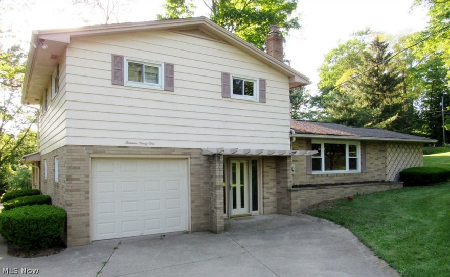 Spacious 3 bedroom, Tri Level home with screened in porch on a 2.16 acre country lot with great views. Some of the many updates include septic 2005, windows 2006, garage door and opener 2007, updated kitchen 2010, water softener holding tank 2008 and new carpet 2010. The 26X38 pole building  has electric plus new garage doors installed in 2013. Call today for your showing.