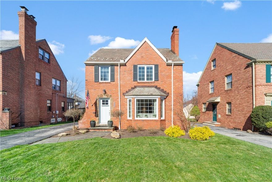 This brick stunner on charming and desirable Fenwood Road in University Heights is not to be missed and the perfect place to call home. Step inside and through a charming entry to behold a sun filled living room with picture window, hardwood floors, crown moldings and gas fireplace. Archways take you to the kitchen or formal dining room which also opens to the family room addition. The family room addition is perfect for entertaining large gatherings with a slider to the patio, room for large sectionals and access to the kitchen. Jaw dropping kitchen! White custom shaker style cabinetry, quartz countertops, full package of stainless appliances and breakfast bar. A handy mudroom area and powder room near the side door rounds out the first floor. On the 2nd floor, find 3 bedrooms with hardwood floors and ample closet space serviced by an updated hall bath with tub shower combo. Hall closet features washer/dryer connect! Sunny deck off 3rd bedroom. 3rd floor is a primary suite oasis with