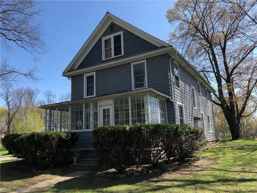 This wonderful 5 bedroom, 2 full bath colonial is nestled on a rare two acre parcel in Painesville with so many great features. There is a huge garden area, large barn with both a loft and basement which offers tons of storage, and a separate building that can be used for anything the imagination can come up with. The house has updates that include roof in 2015, many of the windows replaced in 2019 and a newer furnace. So much character and charm in the eat in kitchen with all appliances included, formal dining,  First floor laundry with included washer and dryer, and a living room with fireplace. Front porch is enclosed and offers even more living space to enjoy. Both bathrooms have been updated with the second floor bath being renovated last year. All this and so much more! Come see this wonderful, unique and spacious property!!