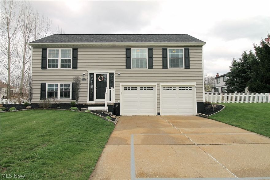 Welcome to 10393 Belleau Drive! This home has been completely updated from roof to floors!  Freshly painted in (2015) with all neutral colors; remodeled kitchen with granite countertops, island for extra counter space, all stainless steel appliances (2011), new lighting throughout and gorgeous bamboo floors all completed in (2013). The family room addition which flows from the kitchen area is light, bright and airy with a beautiful stone gas fireplace, was completed in (2013) as well.  From the family room you are able to exit and go down to the lower deck where you will be so delighted with tons of storage under the family room addition with a 16 x 16 storage room addition which is completely insulated.  Both Baths have also been completely remodeled in (2014) with the latest flooring, tiles and backsplash with plenty of storage.  The lower level you will find is a wonderful master suite retreat complete with a very pretty master bath and huge walk in closet!  The roof was installed in (2011); the furnace, A/C, windows, siding and doors all in (2012).  The 24' pool which is 52" deep along with a two tiered deck were completed in (2015) as well as the newer fence and updated landscaping. The shed was replaced in (2011) and the thermostat in (2013).  This home is just waiting for its new owners to make it there home.  All you need to do is move your boxes in and put your things away.  It's all ready for you!  This won't last long, call for your showing today!