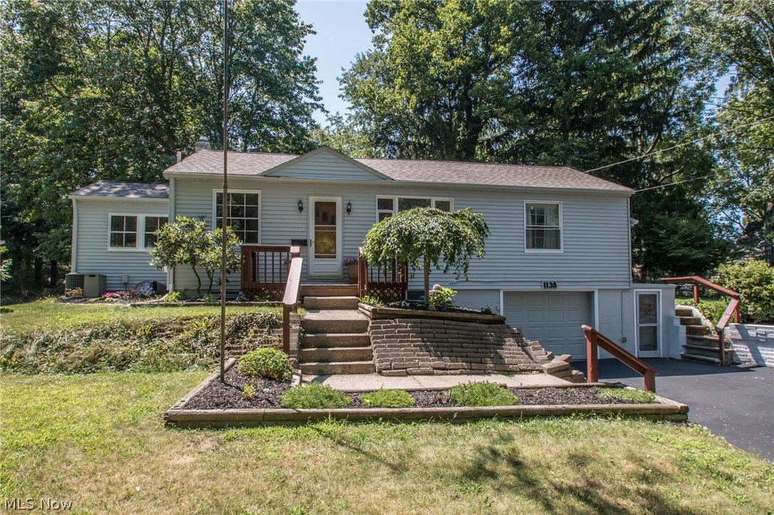 Fantastic updated raised ranch in Kent! Perfect location in a great Kent neighborhood. The home sits back in a friendly, peaceful neighborhood, but still has the convenience of a short drive to downtown Kent, Kent State University, highway access, and shopping. This home boasts 3 bedrooms, 2 full baths, and a finished rec room in the basement. Enjoy the back deck over looking your nicely sized back yard. Call for your private showing.