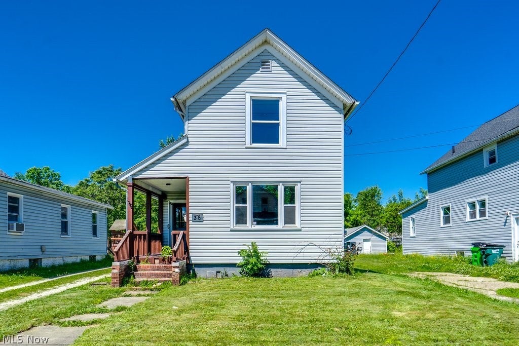 Photo of 36 21st Street NW, Barberton, OH 44203 (MLS # 5214658)