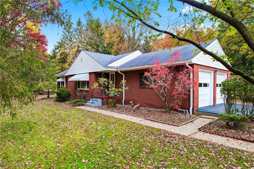 Looking for an all brick ranch home in Howland? You Found it!! This charming two-bedroom, two-bath ranch sits on 1.37 acres with a peaceful park like setting -the perfect blend of comfort and space. Inside, you'll love the roomy eat-in kitchen, bright living room with a picture window, and a cozy gas fireplace. Down the hall are two bedrooms and a full bath. 
The lower level is a total bonus-featuring a spacious rec room with a wood-burning fireplace and bar, a game room, laundry area, full bath, large workhop and even a fruit cellar!
Step outside onto the oversized deck overlooking a corner lot. There's also a storage shed and plenty of space to enjoy the outdoors. What's not to love? Call me today for a showing.
